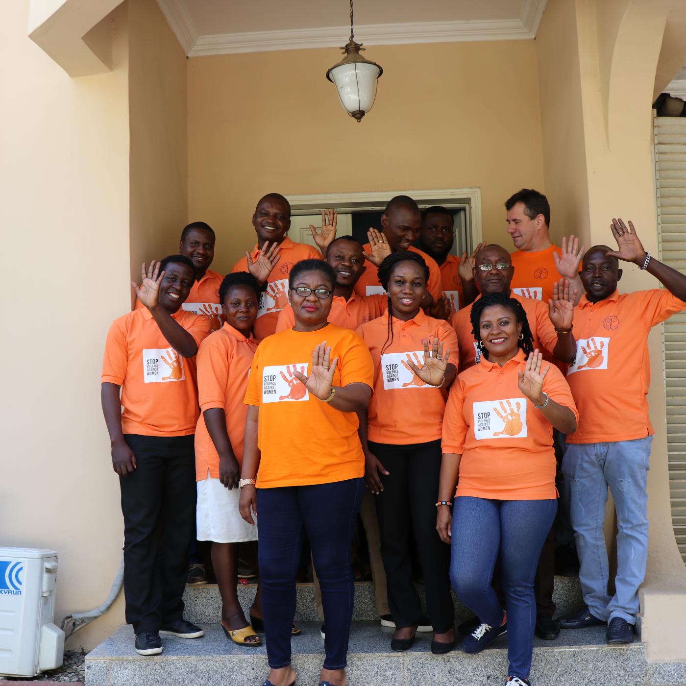 IFES Nigeria staff photographed in orange 